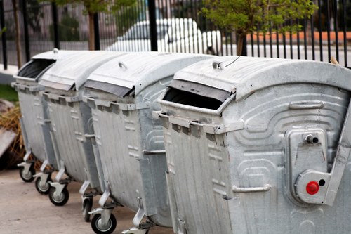 Workers sorting recyclables in a commercial premises in Norwood
